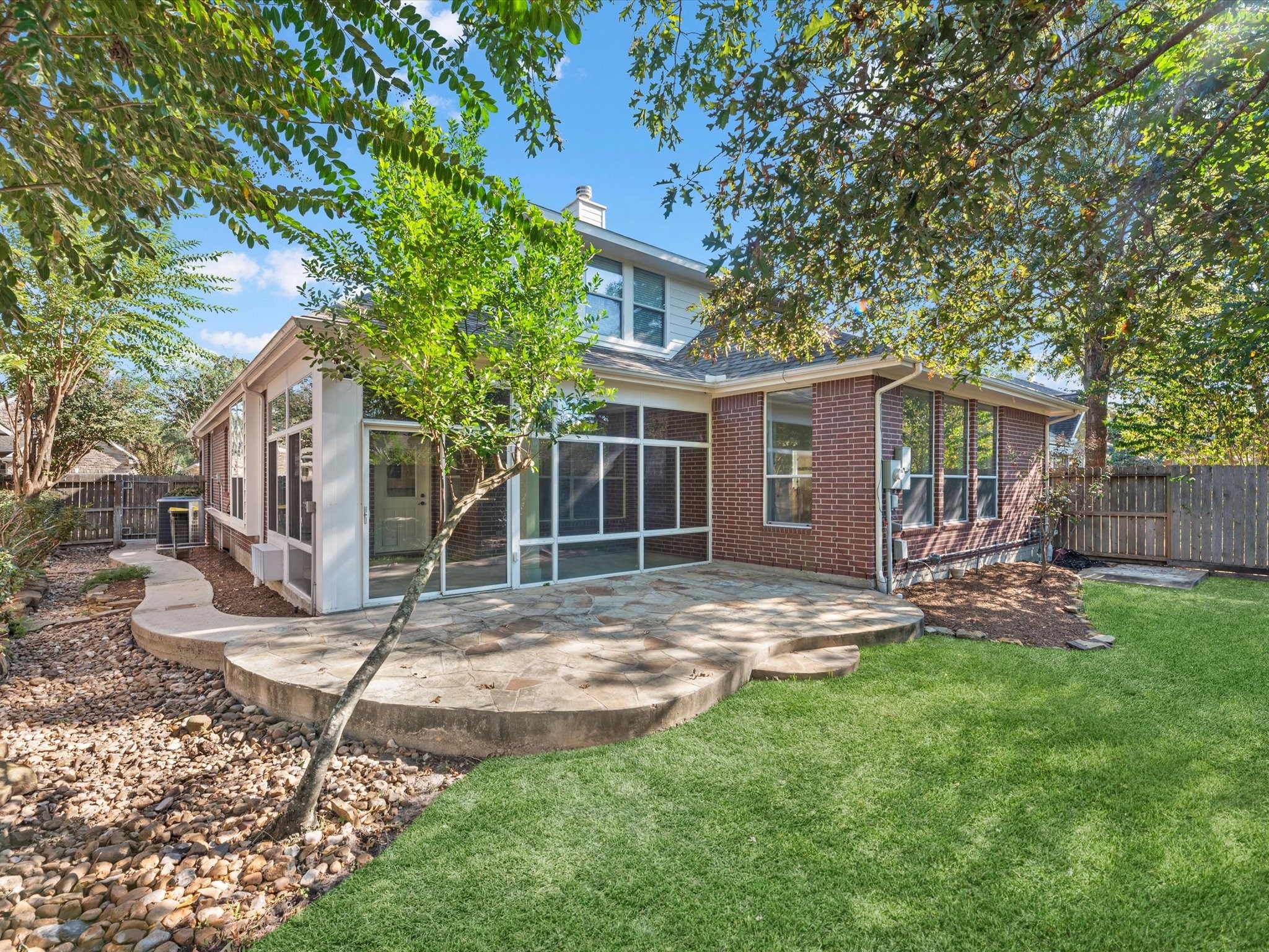 31 Tarrytown Way Conroe, TX 77384 - Photo 31 of 41 a view of a house with backyard