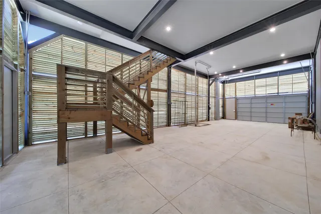 a view of a swimming pool with a garden