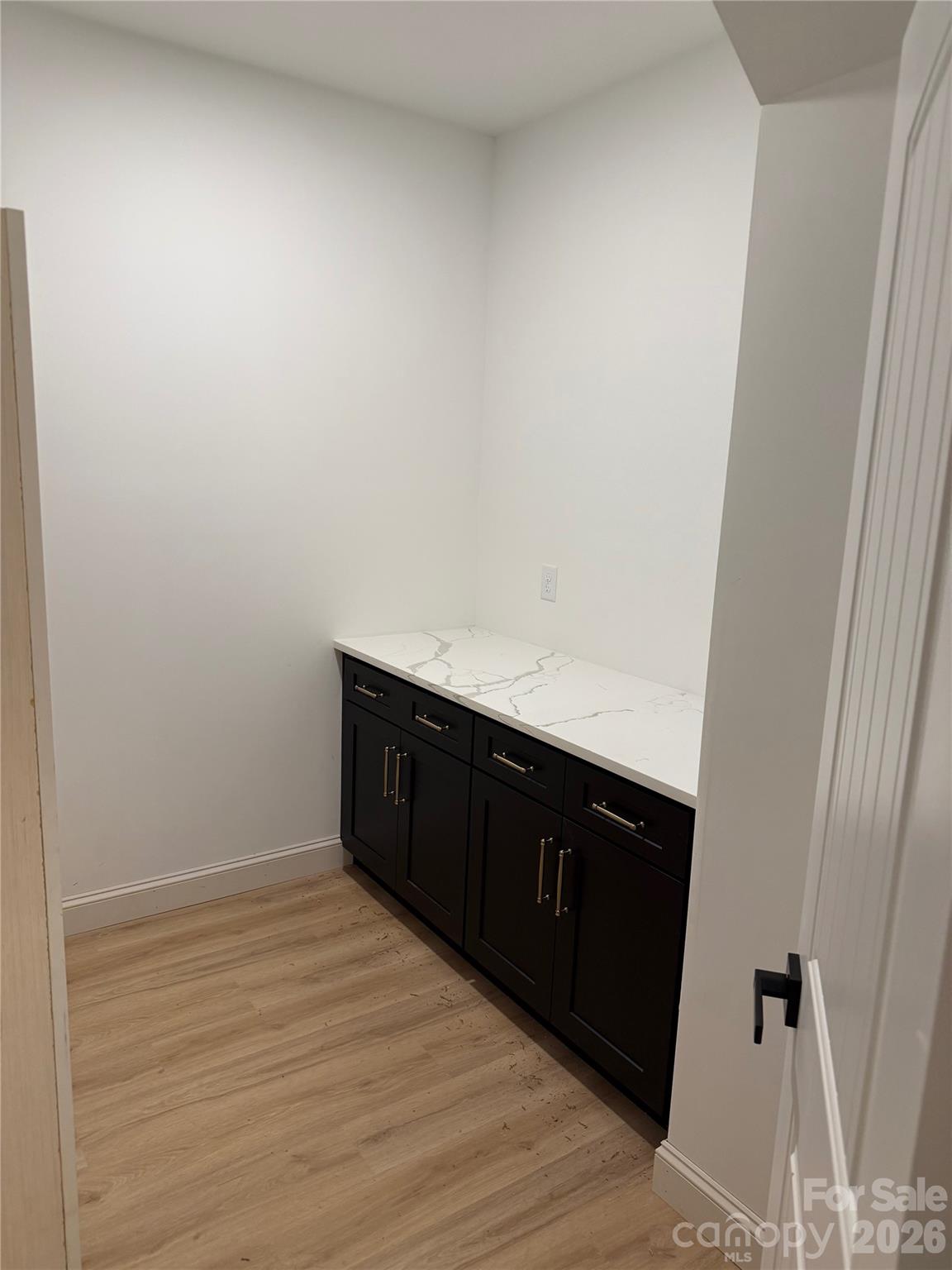 2170 Neel Road Salisbury, NC 28147 - Photo 7 of 21 a kitchen with a sink and a mirror