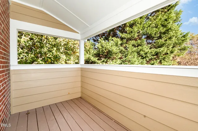 a bathroom with a toilet a sink a mirror and bathtub