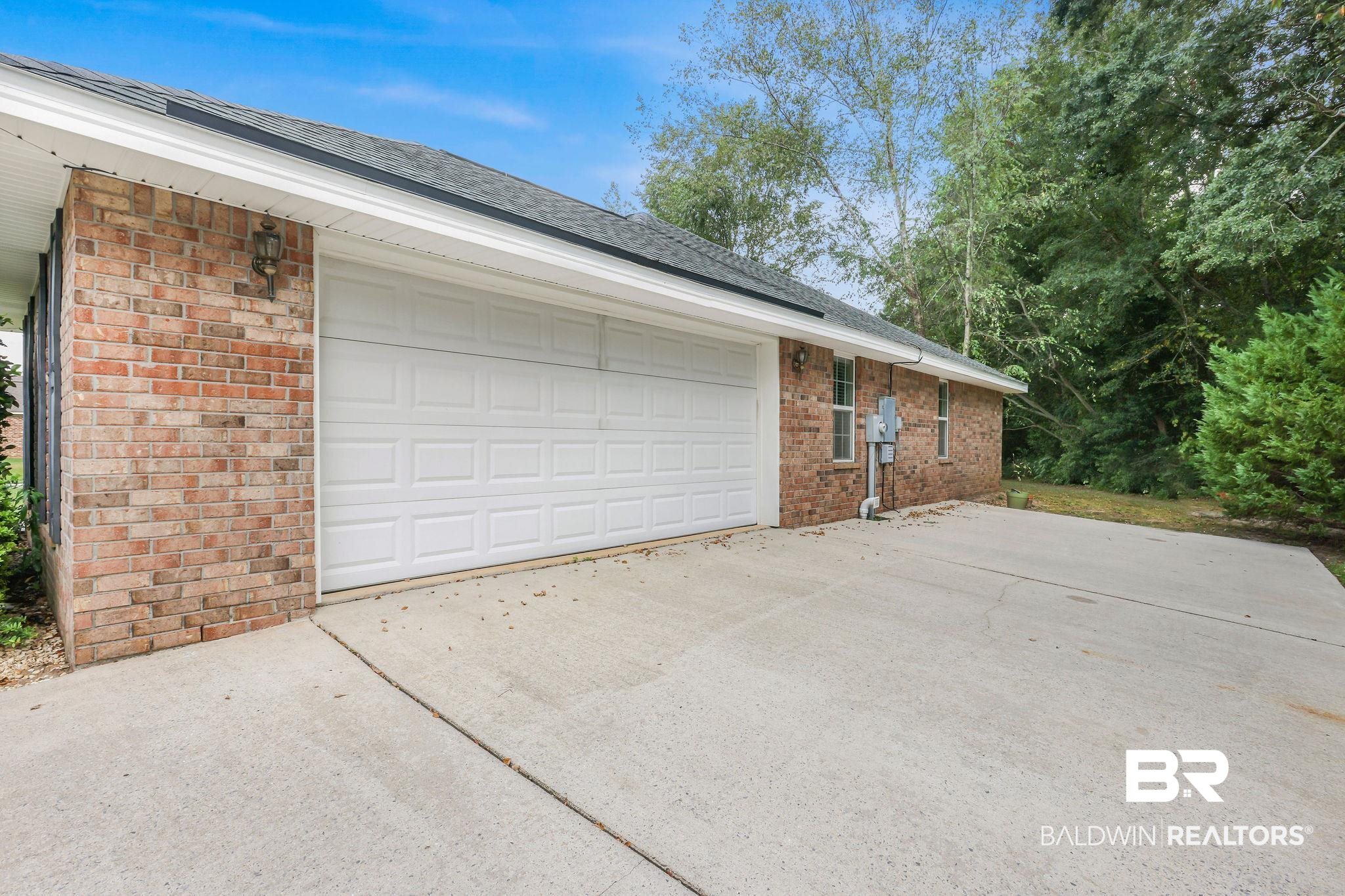 18620 Hammond Street Robertsdale, AL 36567 - Photo 20 of 23 View of garage