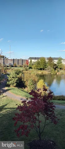 a view of an ocean with city