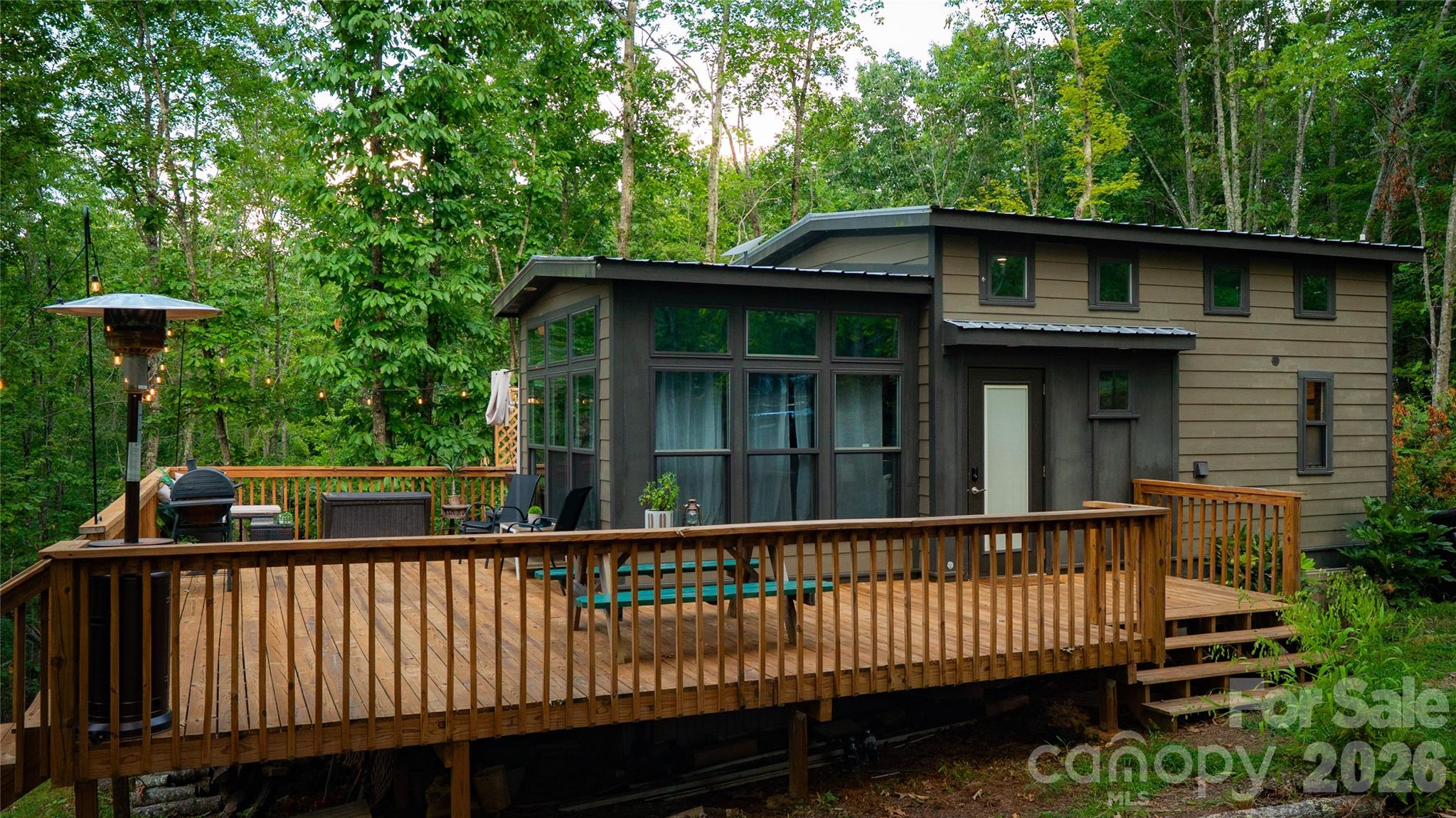 221 Summerfield Lane Rutherfordton, NC 28139 - Photo 20 of 33 a view of a wooden house with a yard