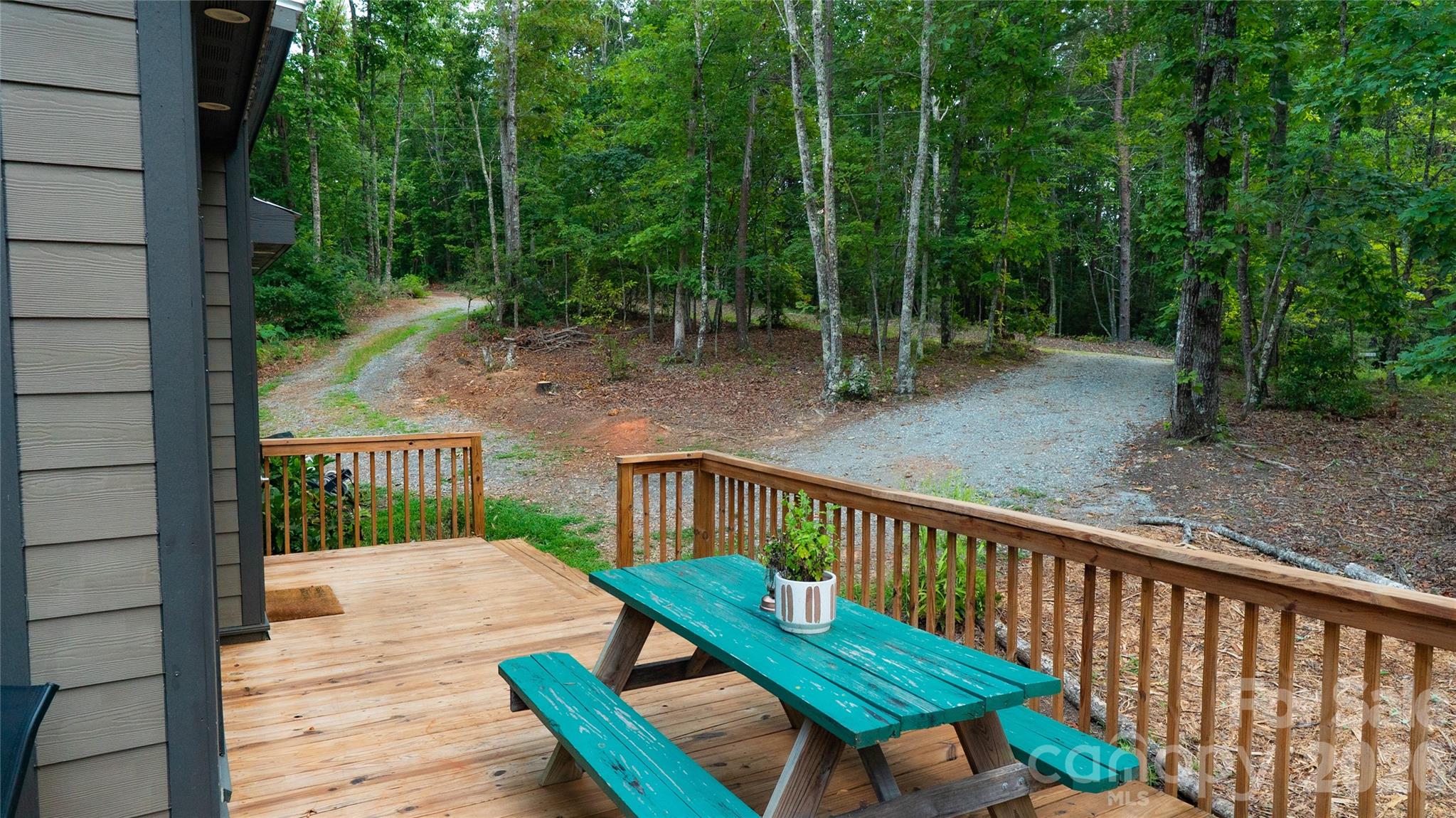 221 Summerfield Lane Rutherfordton, NC 28139 - Photo 26 of 33 a view of a wooden deck with a bench