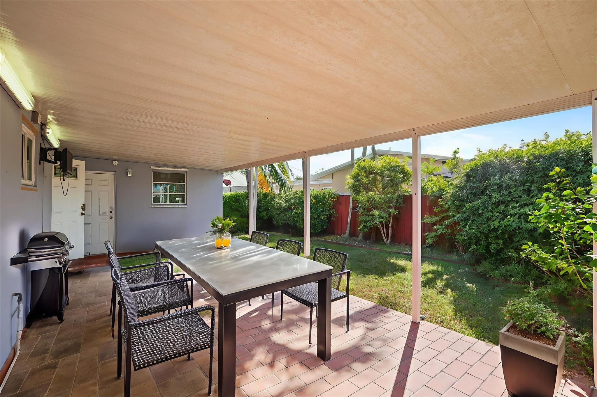 8930 Southwest 38th Street Miami, FL 33165 - Photo 14 of 16 a outdoor view with a sitting space