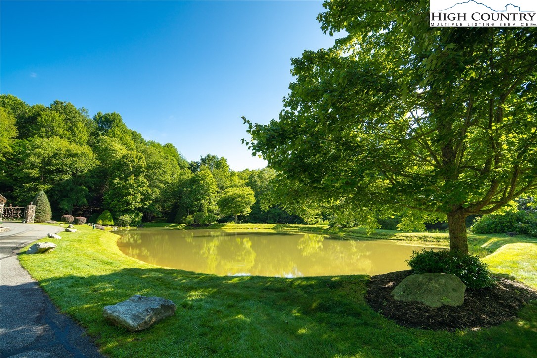 Boulder Creek Drive Boone, NC 28607 - Photo 12 of 25 a view of a swimming pool with a lake view
