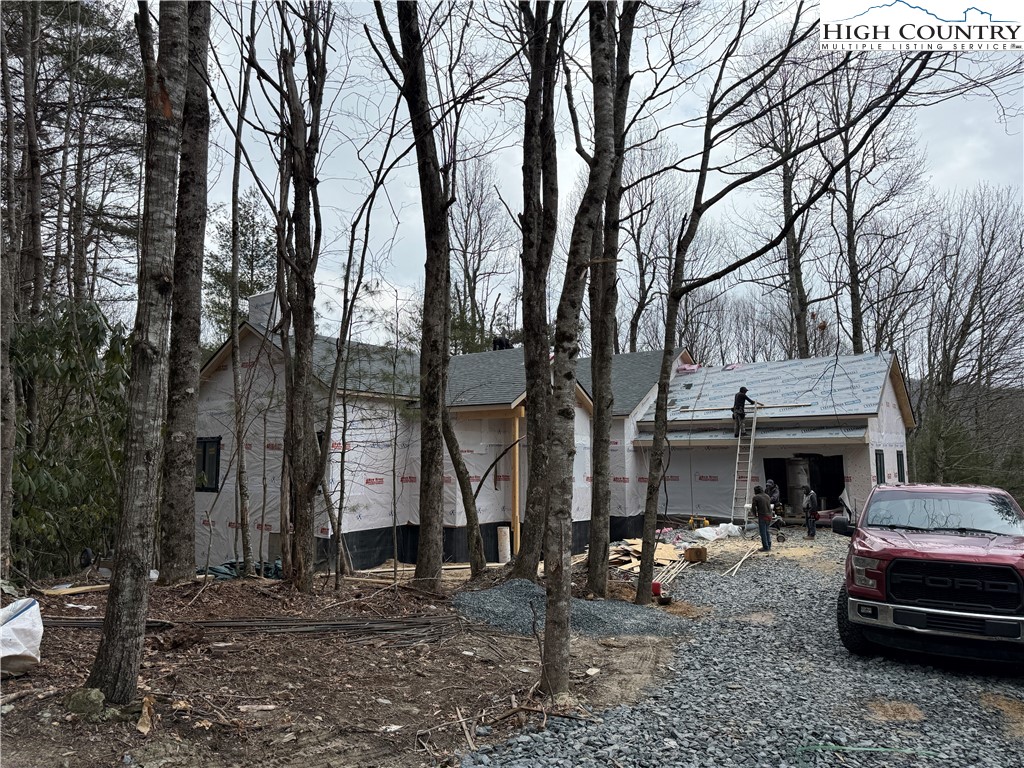 Boulder Creek Drive Boone, NC 28607 - Photo 33 of 38 a view of a house with a backyard