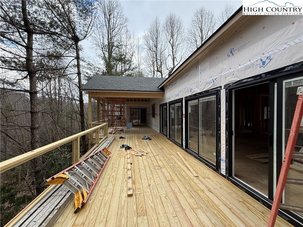 Boulder Creek Drive Boone, NC 28607 - Photo 34 of 38 a view of balcony with a large window and wooden floor