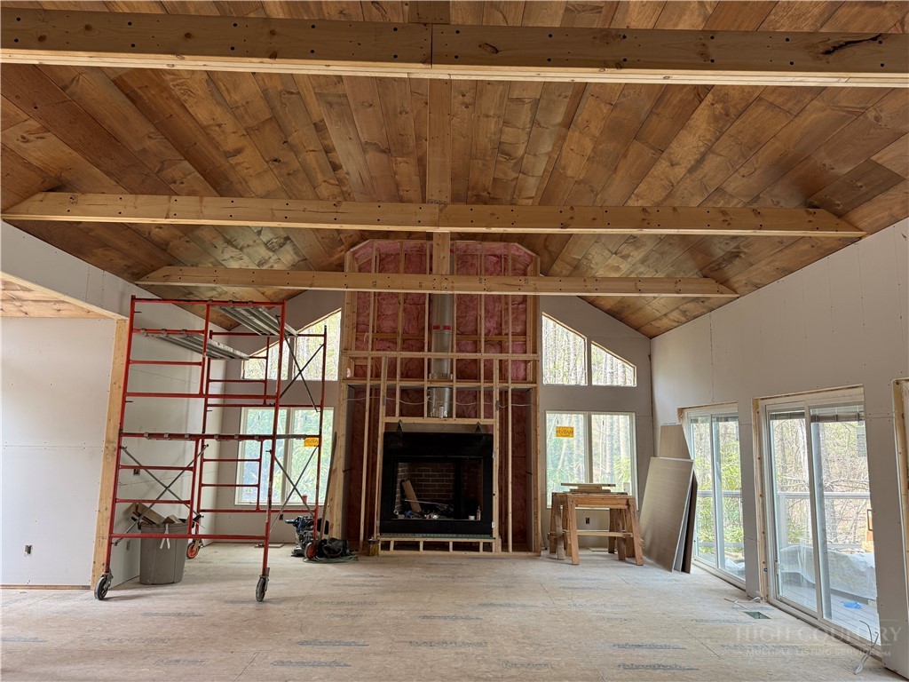 Boulder Creek Drive Boone, NC 28607 - Photo 6 of 32 a view of a livingroom with furniture and a fireplace
