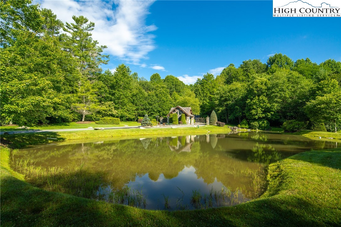 Boulder Creek Drive Boone, NC 28607 - Photo 10 of 25 a view of a swimming pool with a yard