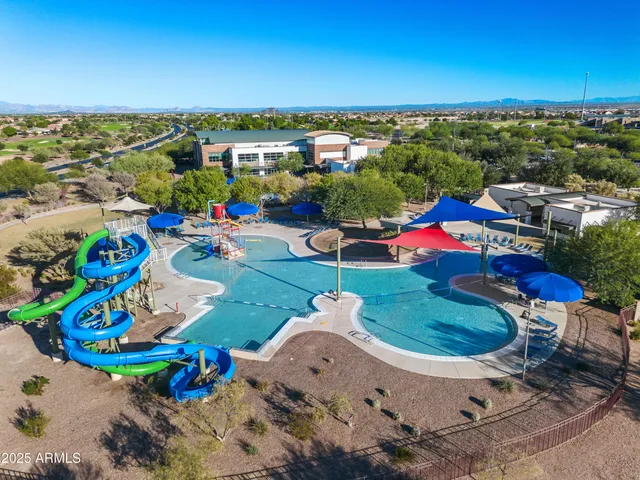 an aerial view of a houses with outdoor space