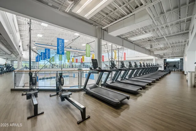 a room with lots of wooden furniture