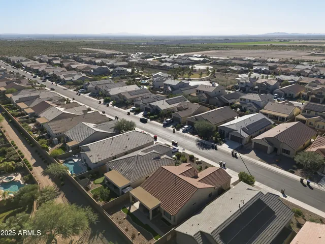 an aerial view of a city with lots of residential buildings