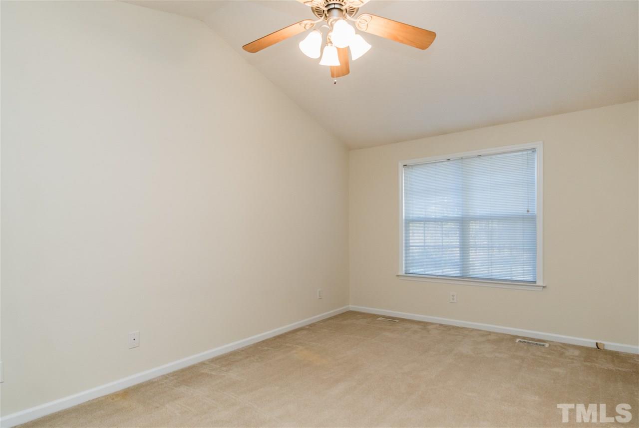 118 Setter Point Clayton, NC 27520 - Photo 12 of 21 an empty room with a window