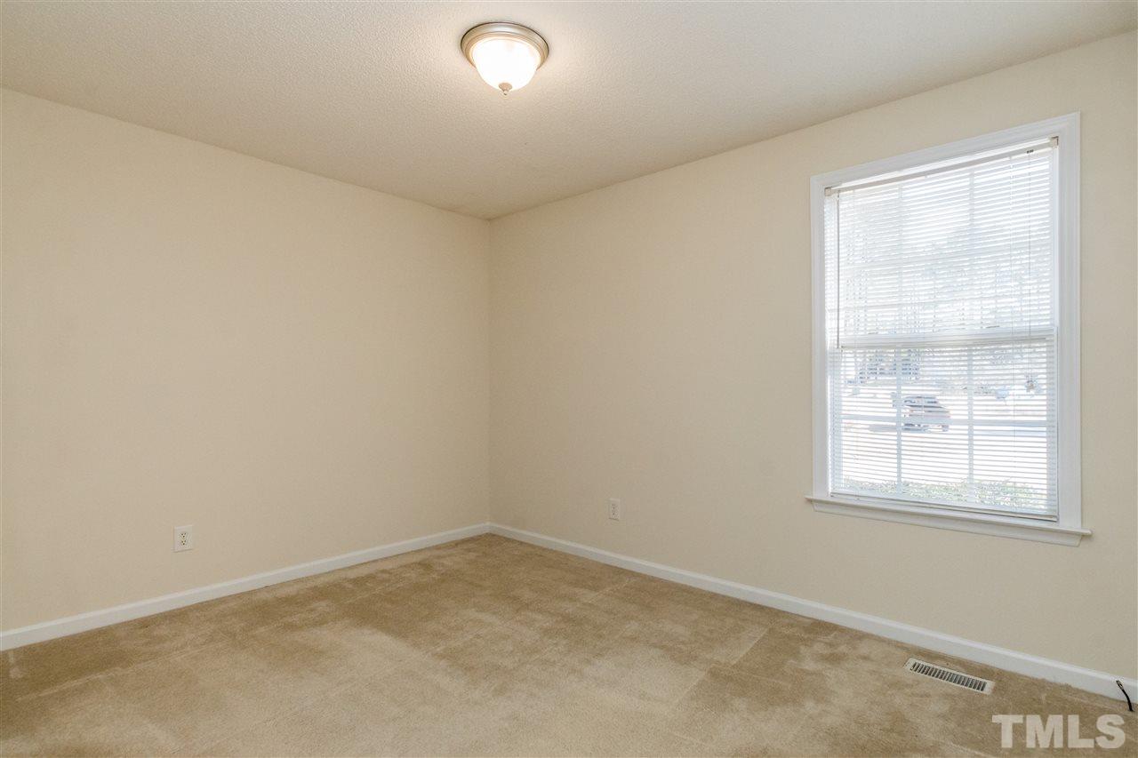 118 Setter Point Clayton, NC 27520 - Photo 15 of 21 an empty room with a window