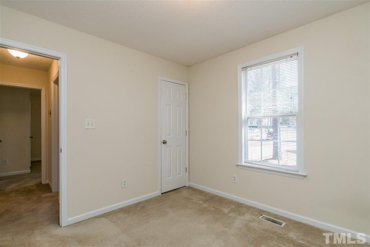 118 Setter Point Clayton, NC 27520 - Photo 17 of 21 an empty room with windows