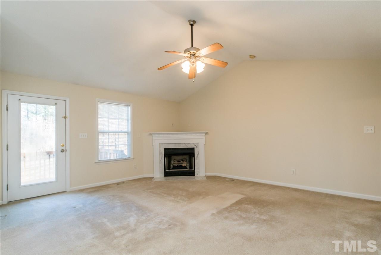 118 Setter Point Clayton, NC 27520 - Photo 3 of 21 a view of an empty room with a window