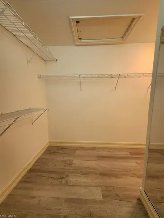 a view of a room with racks on the wall