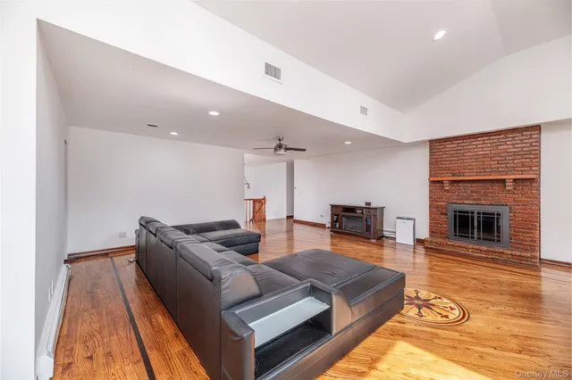 a kitchen with a stove top oven and refrigerator