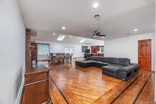 a living room with furniture and a table