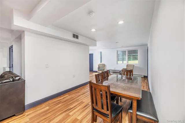 a kitchen with a stove a sink and a microwave