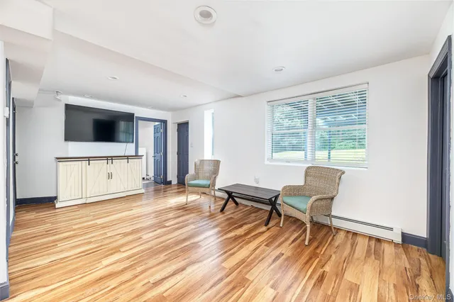 a view of a dining room with furniture window and outside view