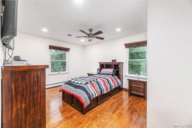 a view of livingroom with furniture and workspace