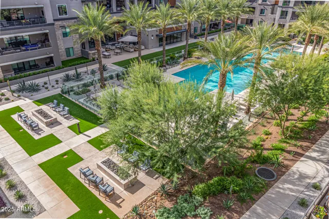 a backyard of a house with outdoor seating