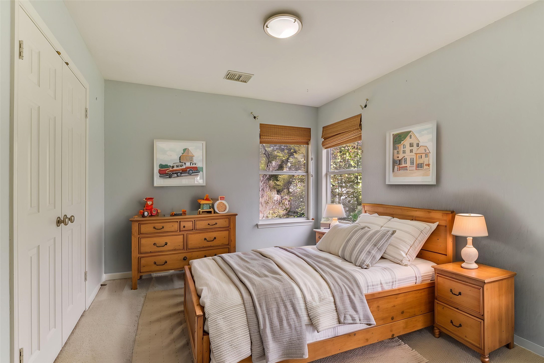 2218 Equestrian Trail Austin, TX 78727 - Photo 33 of 39 Virtually Staged: Bedroom featuring a closet and carpet floors