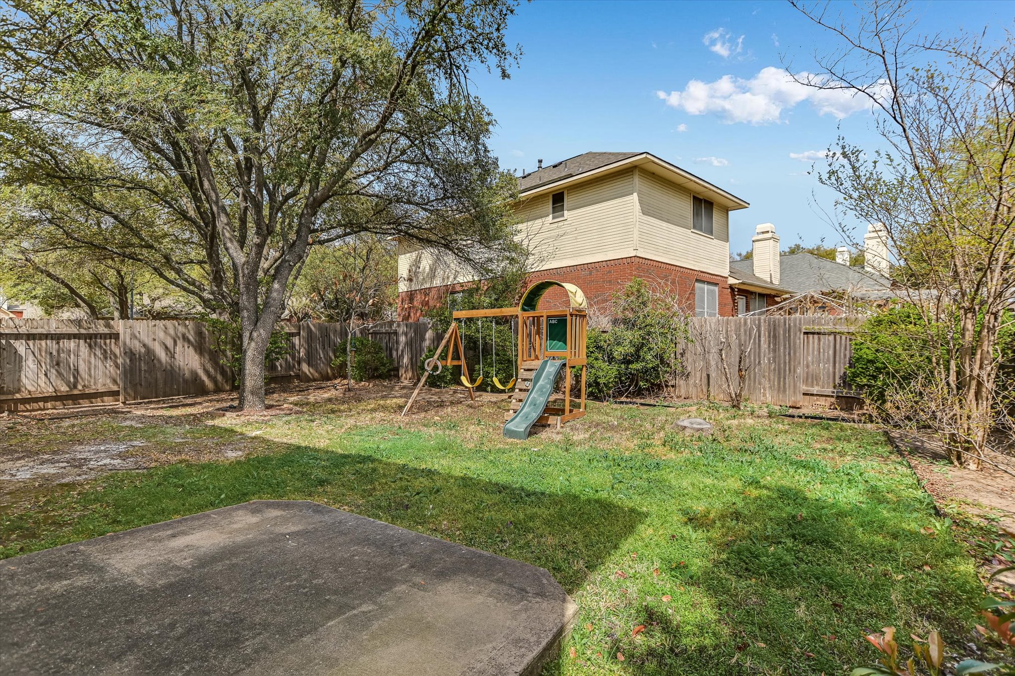 2218 Equestrian Trail Austin, TX 78727 - Photo 37 of 39 Fenced backyard with a playground