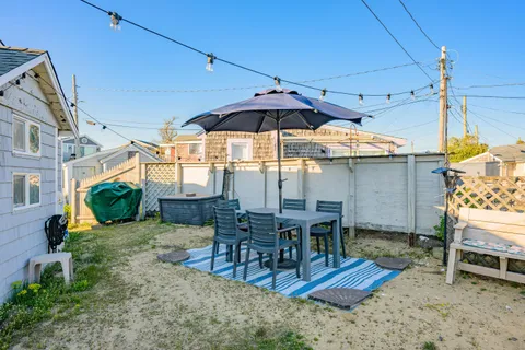 a view of a dinning tables and chairs in the patio