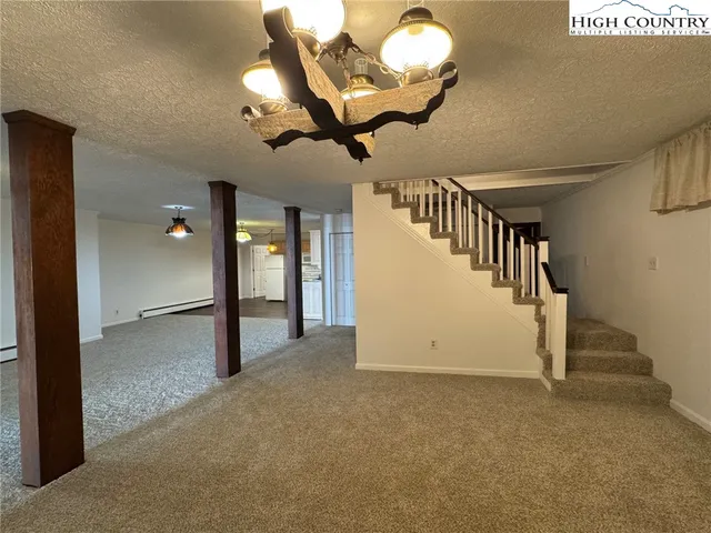 a living room with a fireplace