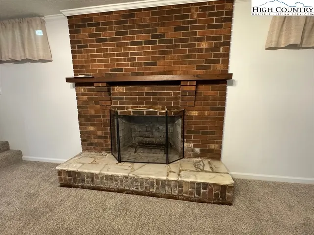 a white refrigerator freezer sitting inside of a kitchen