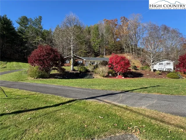 a view of a street with houses