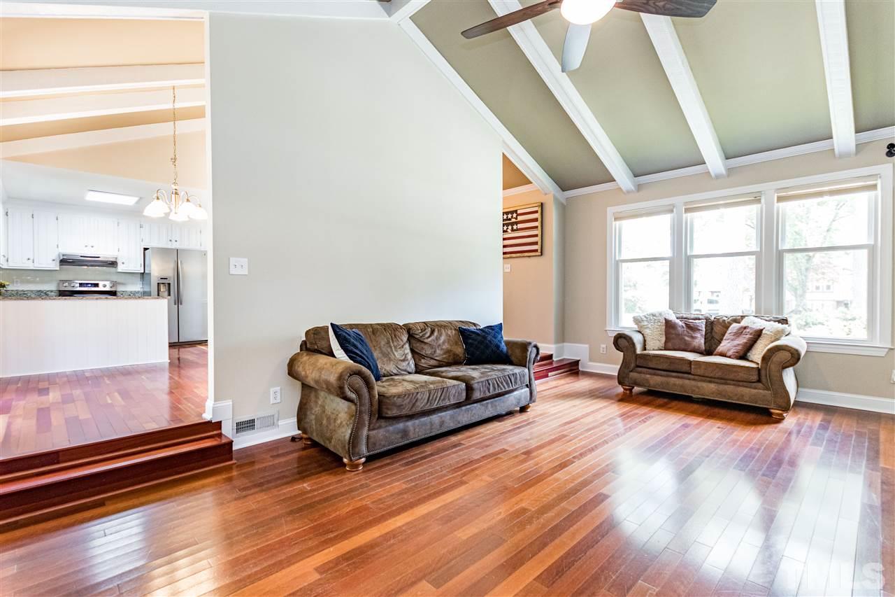 2021 Port Royal Road Raleigh, NC 27609 - Photo 11 of 23 a living room with furniture and a large window