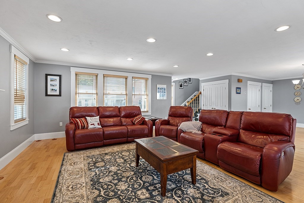 8 Perham Street Chelmsford, MA 01824 - Photo 19 of 42 a living room with furniture a rug and a window