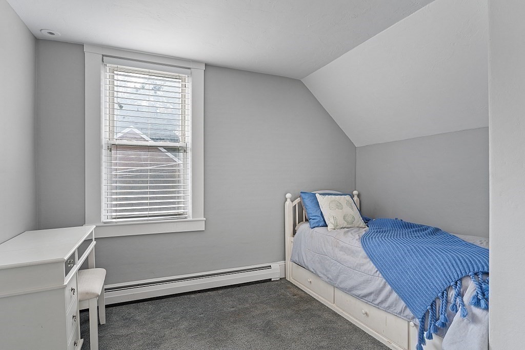 8 Perham Street Chelmsford, MA 01824 - Photo 33 of 42 a bed room with a bed and a window