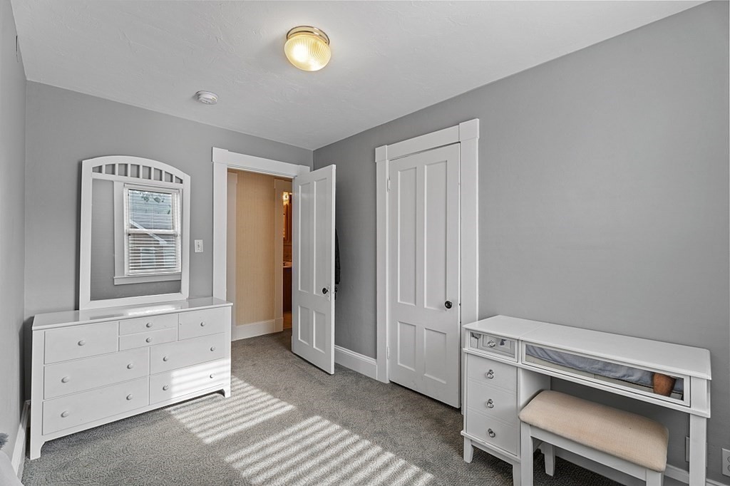 8 Perham Street Chelmsford, MA 01824 - Photo 34 of 42 a view of room with stairs and furniture