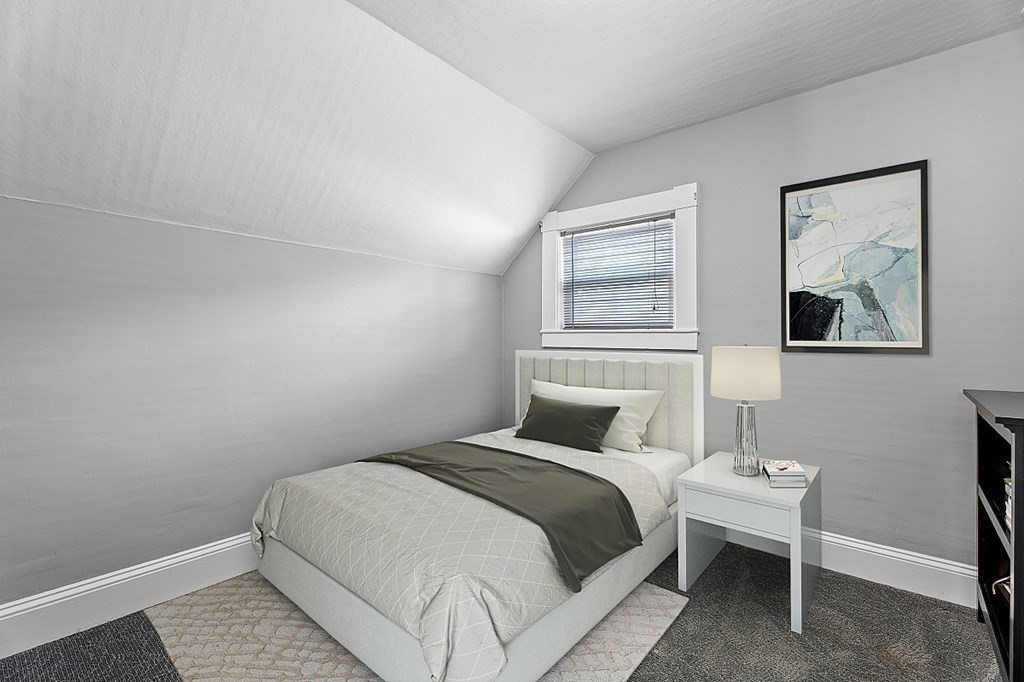 8 Perham Street Chelmsford, MA 01824 - Photo 36 of 42 a bedroom with a bed and a window