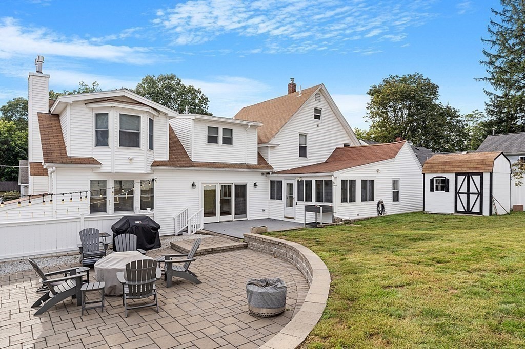 8 Perham Street Chelmsford, MA 01824 - Photo 6 of 42 a view of a house with swimming pool and sitting area