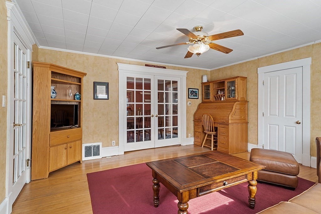8 Perham Street Chelmsford, MA 01824 - Photo 10 of 42 a living room with furniture and wooden floor