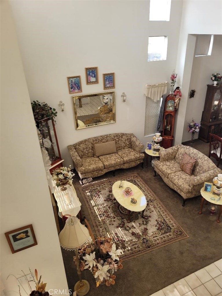 866 Homestead Road Corona, CA 92878 - Photo 12 of 15 a bedroom with furniture and a wooden floor