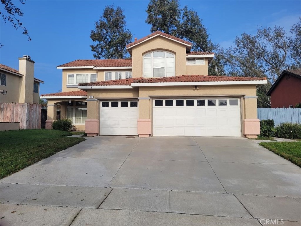866 Homestead Road Corona, CA 92878 - Photo 2 of 15 a view of house with yard and trees in the background