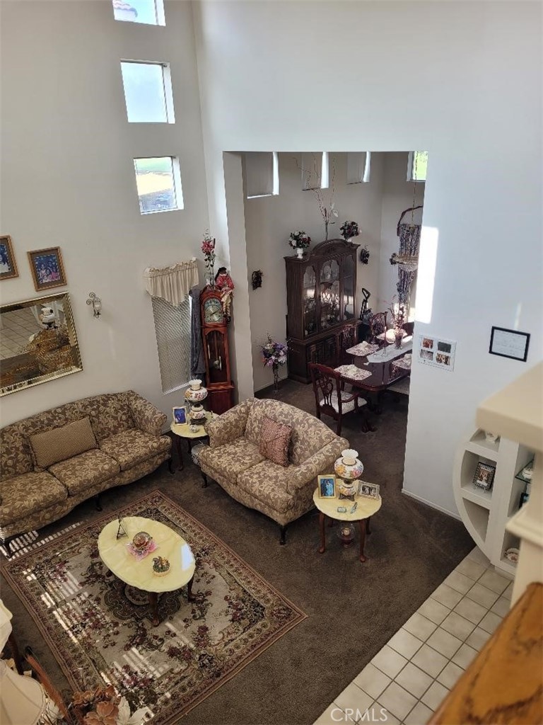 866 Homestead Road Corona, CA 92878 - Photo 7 of 15 a living room with furniture and a table