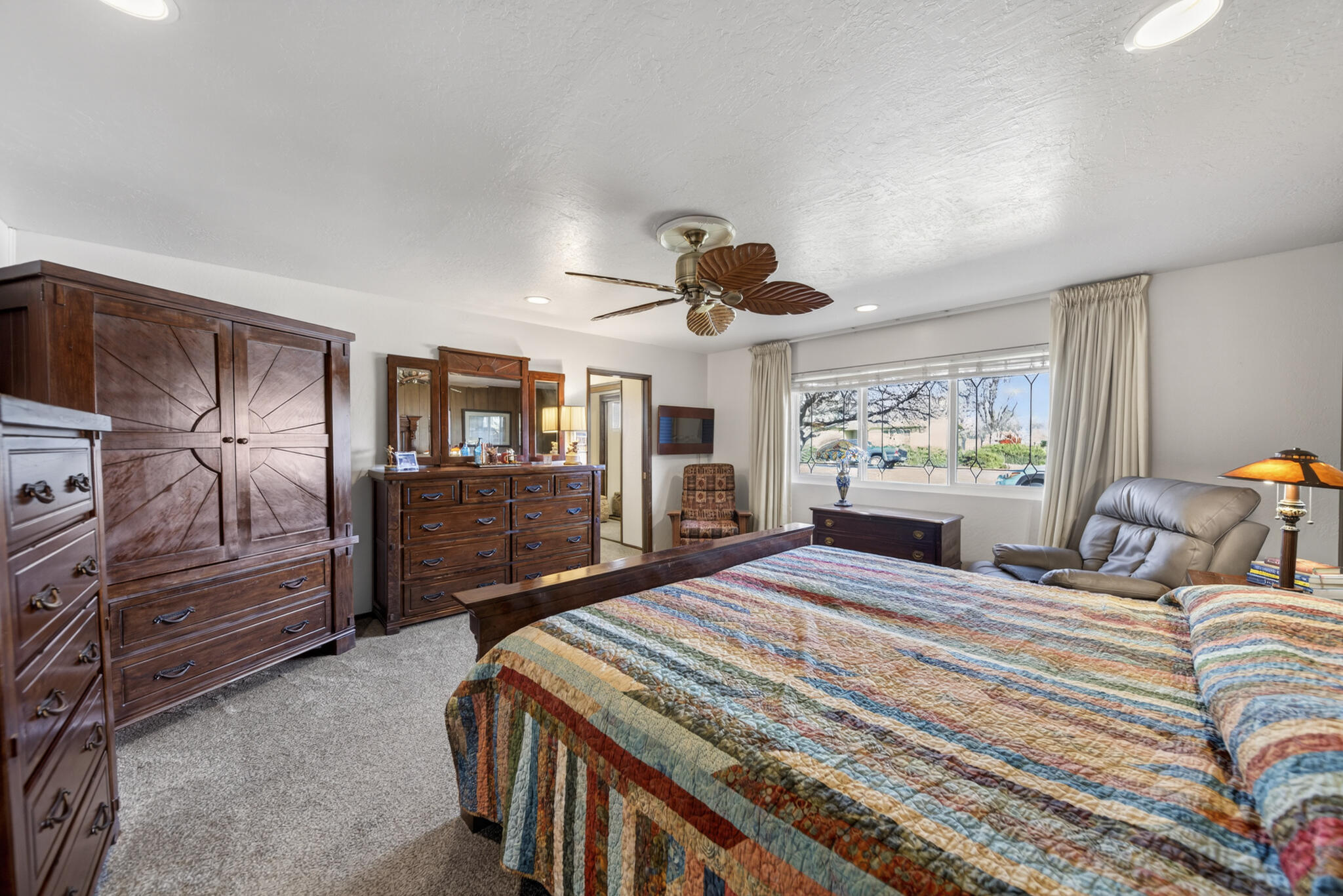 3605 Tamarack Drive Redding, CA 96003 - Photo 16 of 49 a bedroom with a bed and a flat screen tv