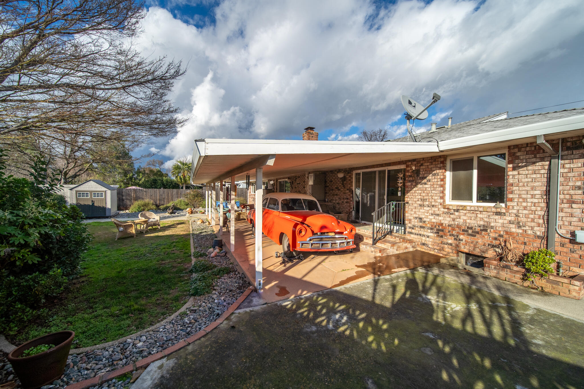 3605 Tamarack Drive Redding, CA 96003 - Photo 41 of 49 a view of a patio with table and chairs and potted plants