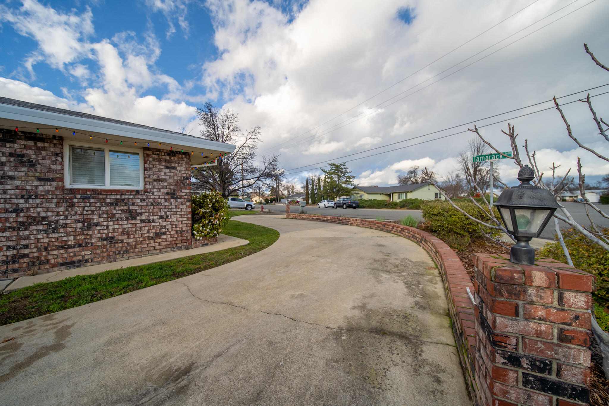 3605 Tamarack Drive Redding, CA 96003 - Photo 46 of 49 a front view of a house with a yard and outdoor seating