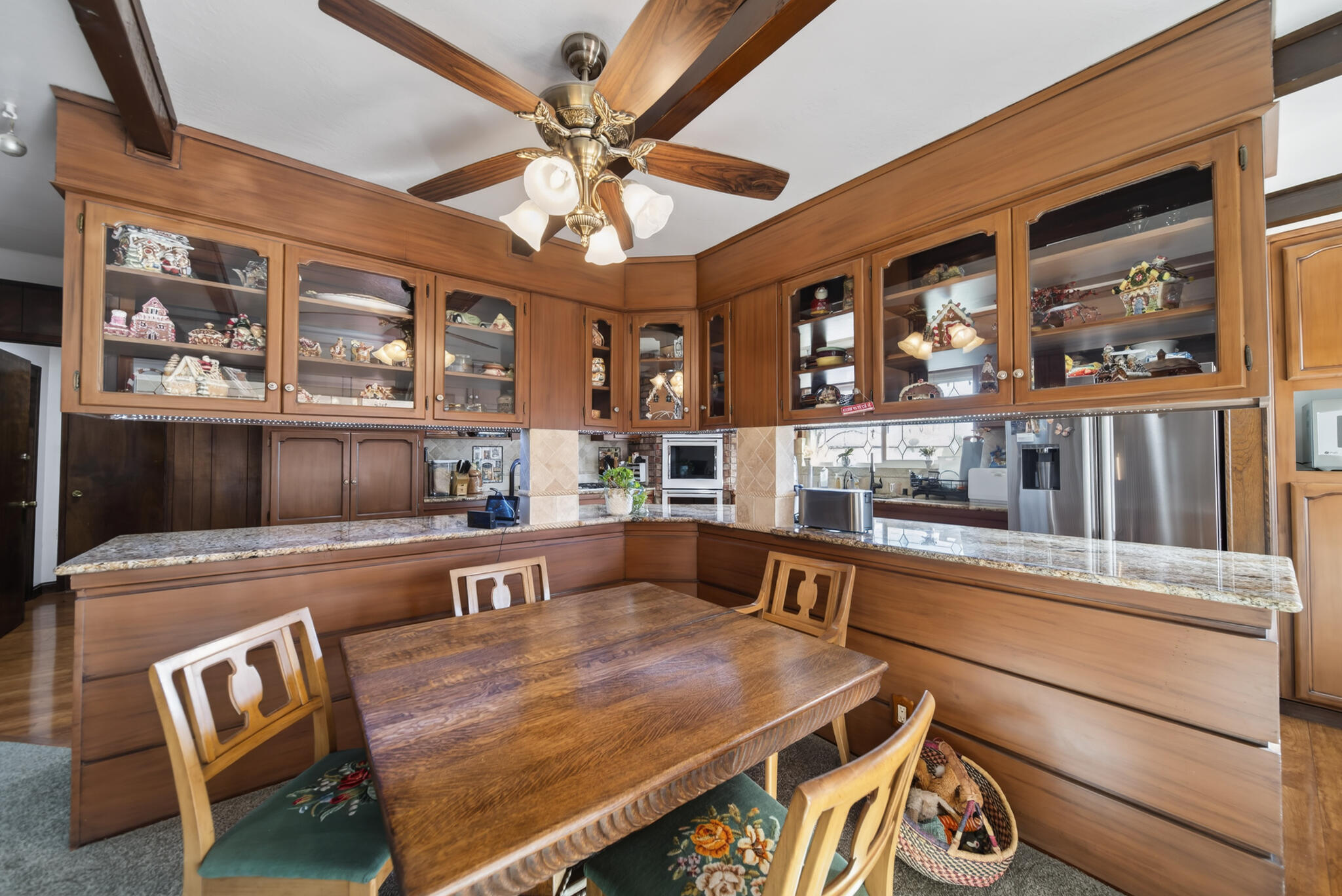 3605 Tamarack Drive Redding, CA 96003 - Photo 7 of 49 a living room with stainless steel appliances kitchen island granite countertop furniture and a kitchen view