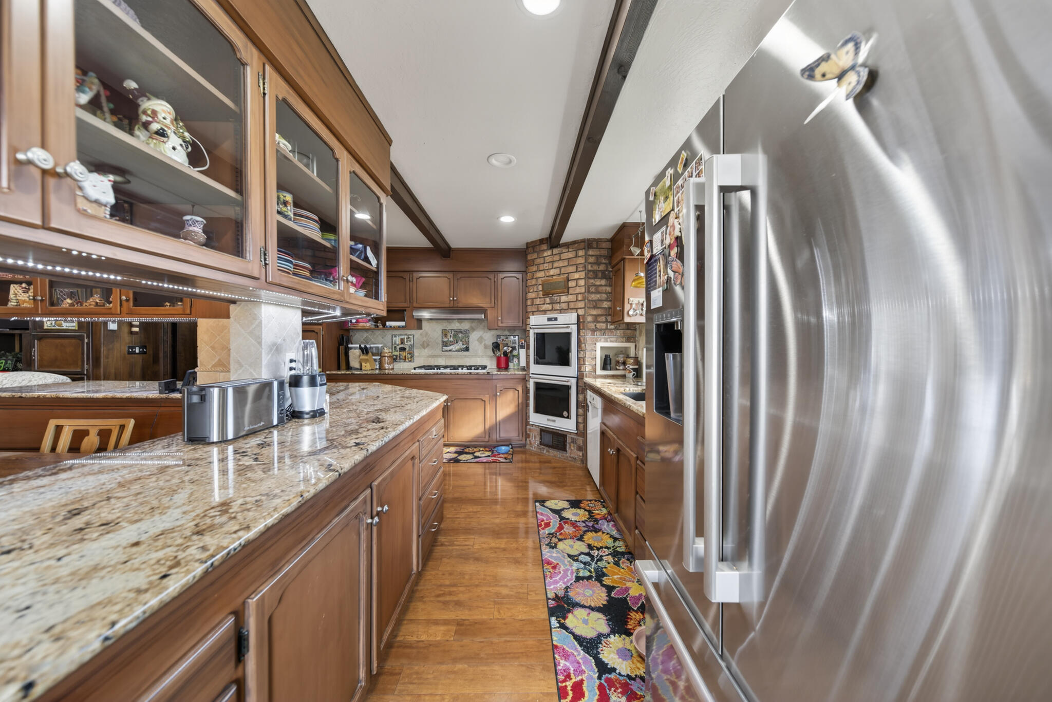 3605 Tamarack Drive Redding, CA 96003 - Photo 10 of 49 a kitchen with stainless steel appliances granite countertop a refrigerator and a sink