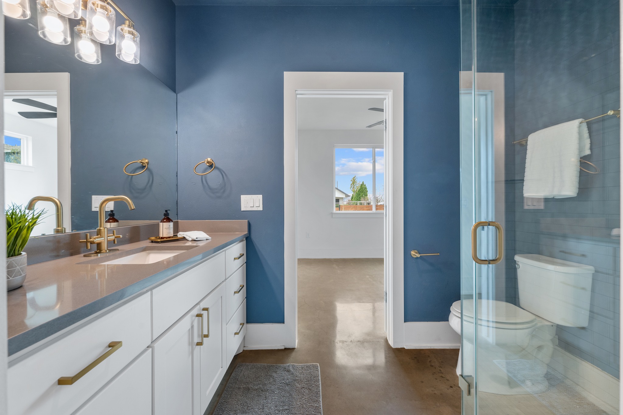 5000 Baker Street Austin, TX 78721 - Photo 21 of 40 The main floor bathroom features a large vanity with generous counter space and storage for everyday essentials